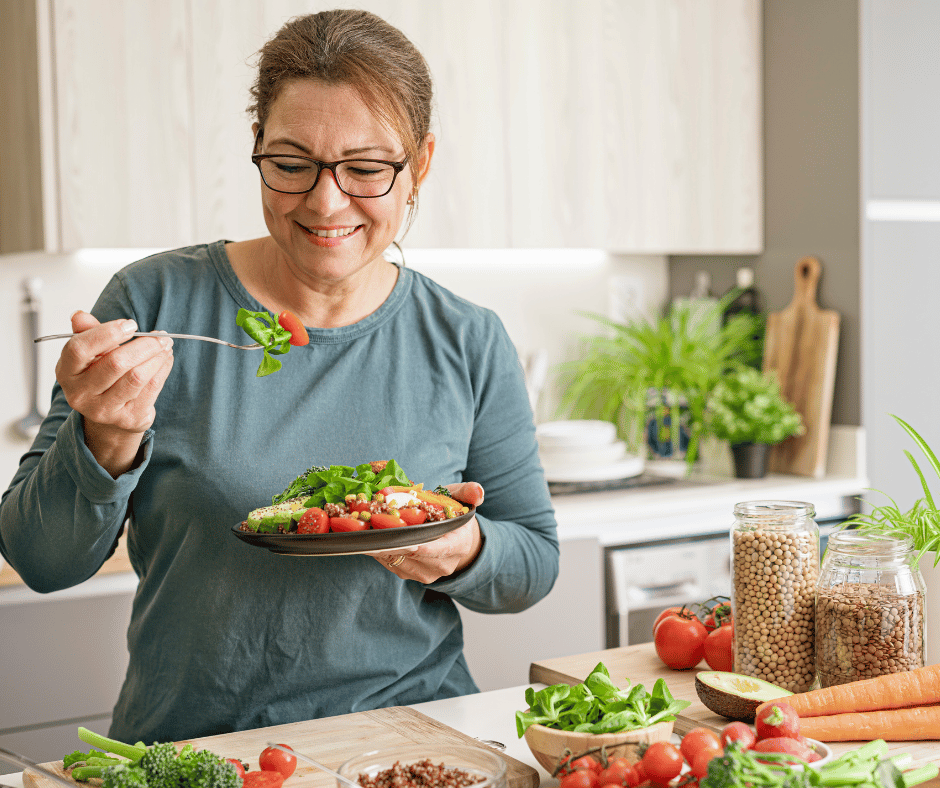 Woman eating a bowl of food